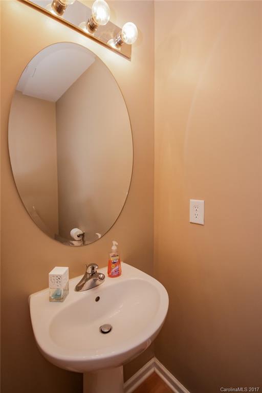 150 Limerick Road, Unit C Mooresville, NC 28115 - Photo 10 of 17 a bathroom with a sink and mirror