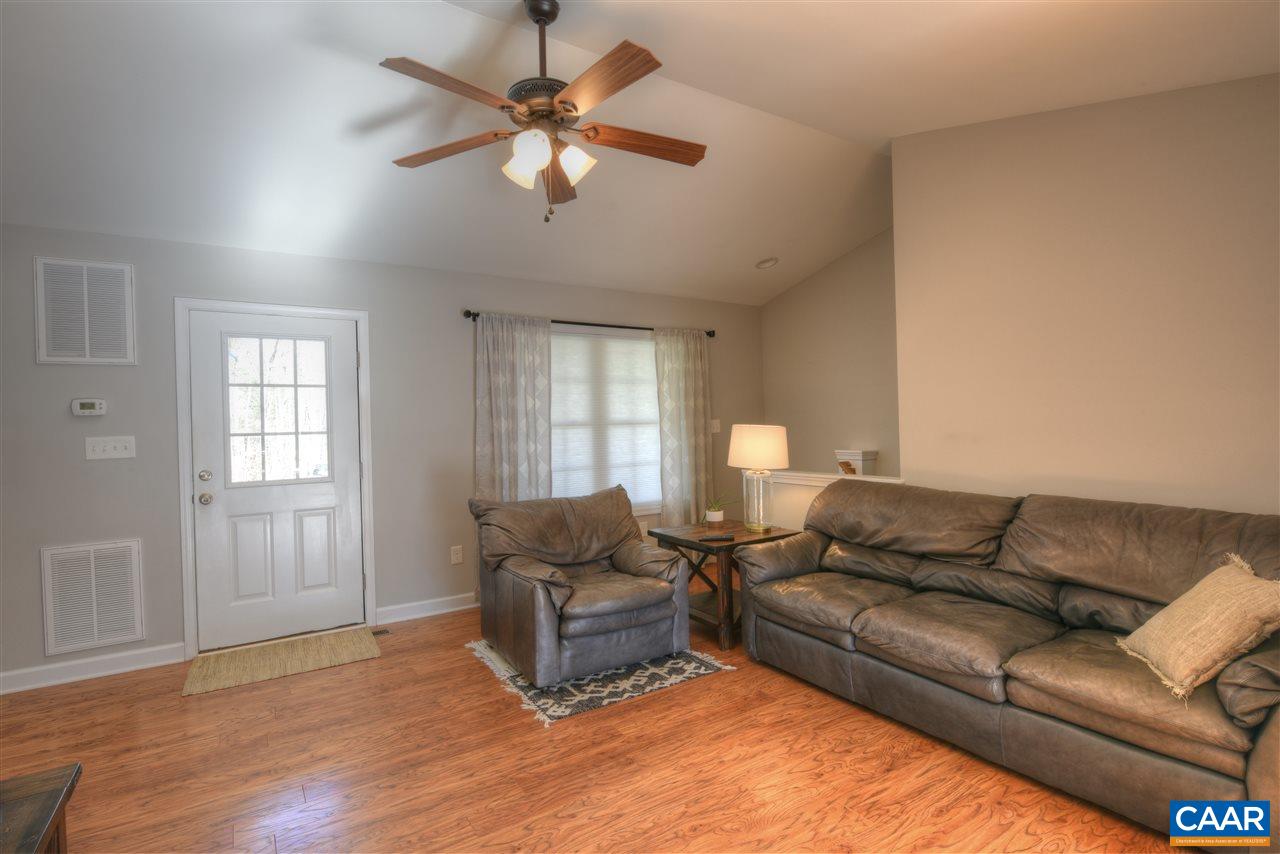 9 Buck Island Road Palmyra, VA 22963 - Photo 11 of 28 a living room with furniture and a window