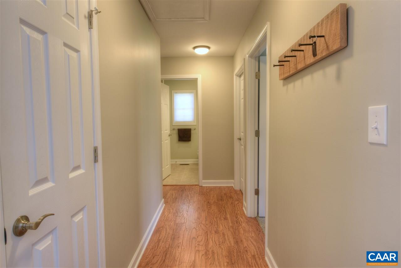 9 Buck Island Road Palmyra, VA 22963 - Photo 12 of 28 a view of a hallway with wooden floor