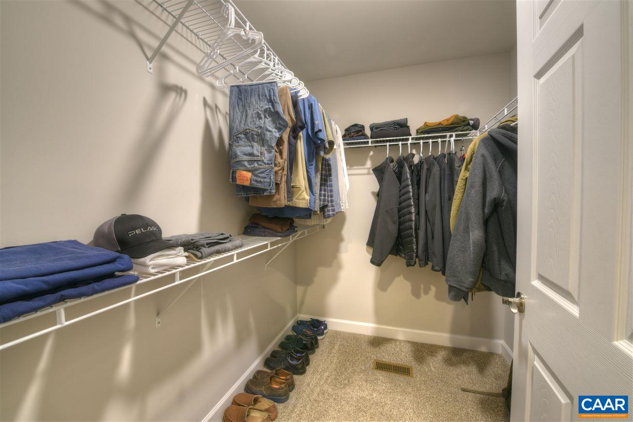 9 Buck Island Road Palmyra, VA 22963 - Photo 19 of 28 a view of walk in closet with clothes and shoes