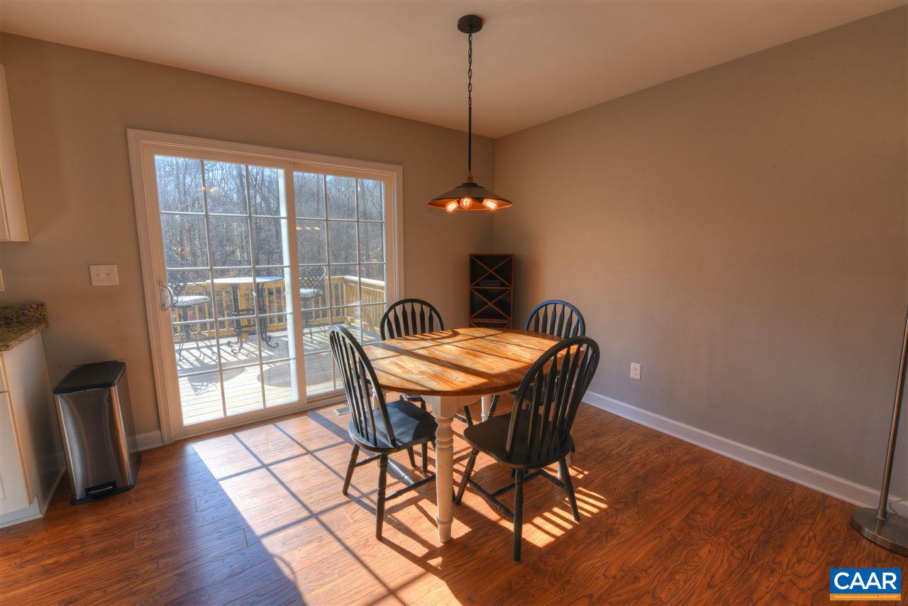 9 Buck Island Road Palmyra, VA 22963 - Photo 4 of 28 a view of a dining room with furniture window and wooden floor
