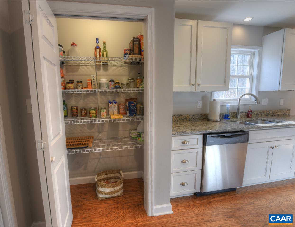 9 Buck Island Road Palmyra, VA 22963 - Photo 9 of 28 a kitchen with granite countertop a refrigerator and a sink