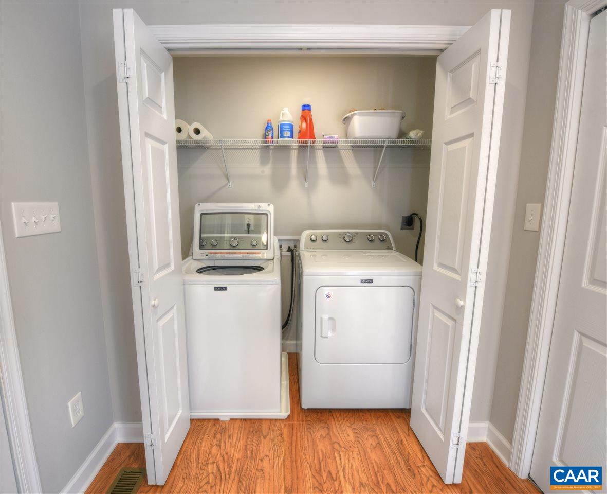 9 Buck Island Road Palmyra, VA 22963 - Photo 10 of 28 a view of washer and dryer with wooden floor