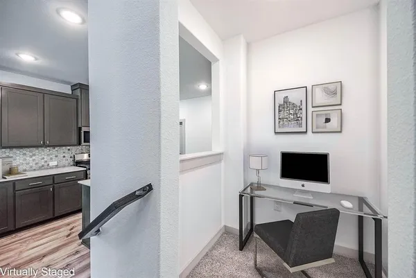 a view of a livingroom with a flat screen tv