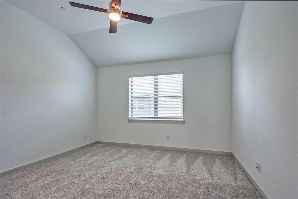 692 Vista Oak Road Lewisville, TX 75067 - Photo 24 of 39 an empty room with a window