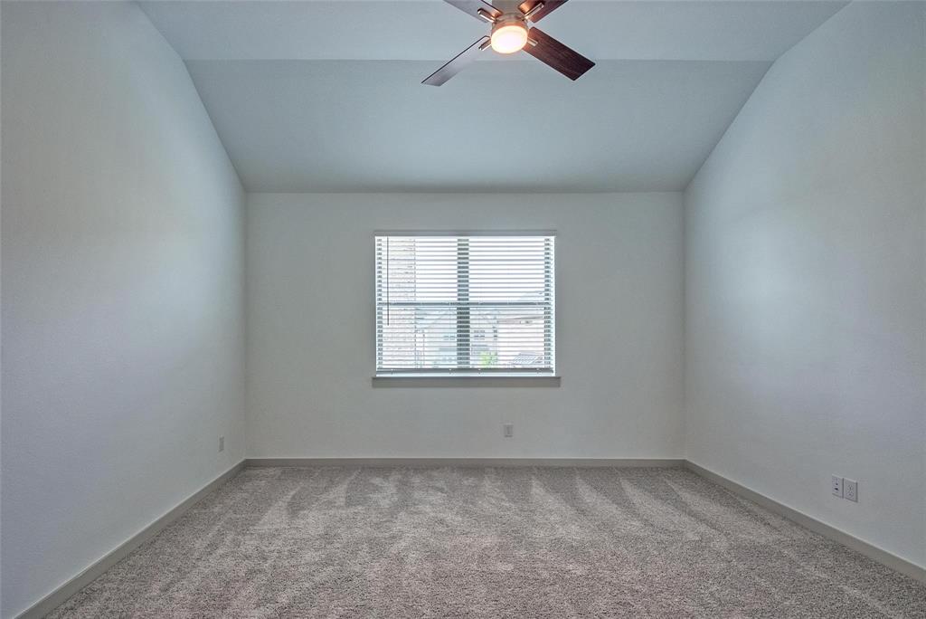 692 Vista Oak Road Lewisville, TX 75067 - Photo 25 of 39 an empty room with a window