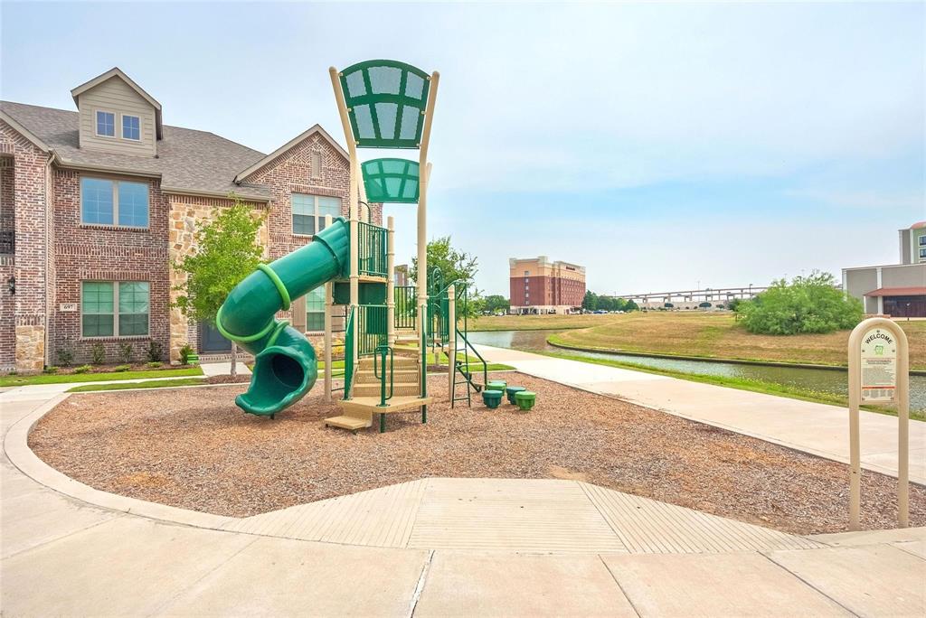 692 Vista Oak Road Lewisville, TX 75067 - Photo 33 of 39 a view of a house with a swimming pool