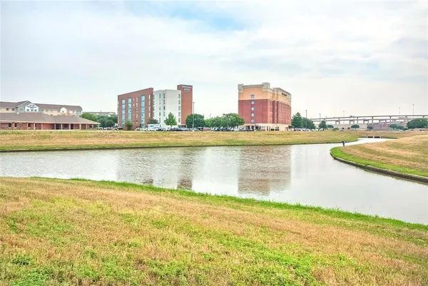 a view of a city with an ocean