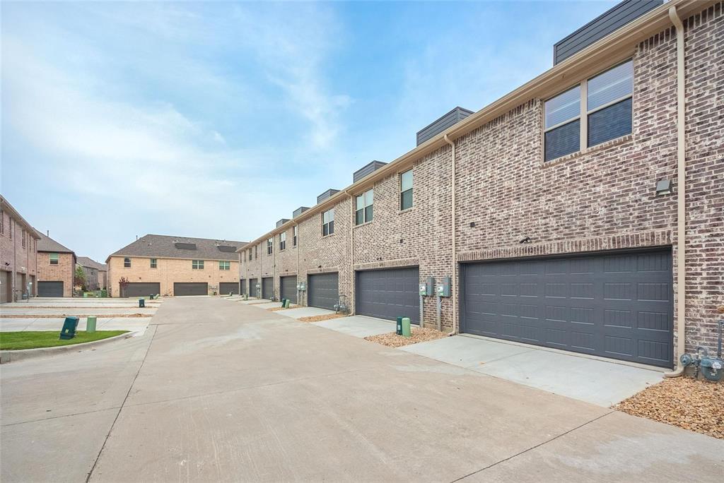692 Vista Oak Road Lewisville, TX 75067 - Photo 37 of 39 a view of a building with many windows