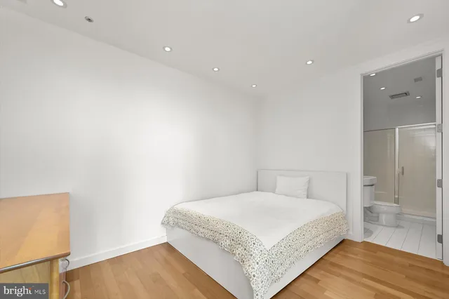 a view of a porch with furniture and floor to ceiling windows