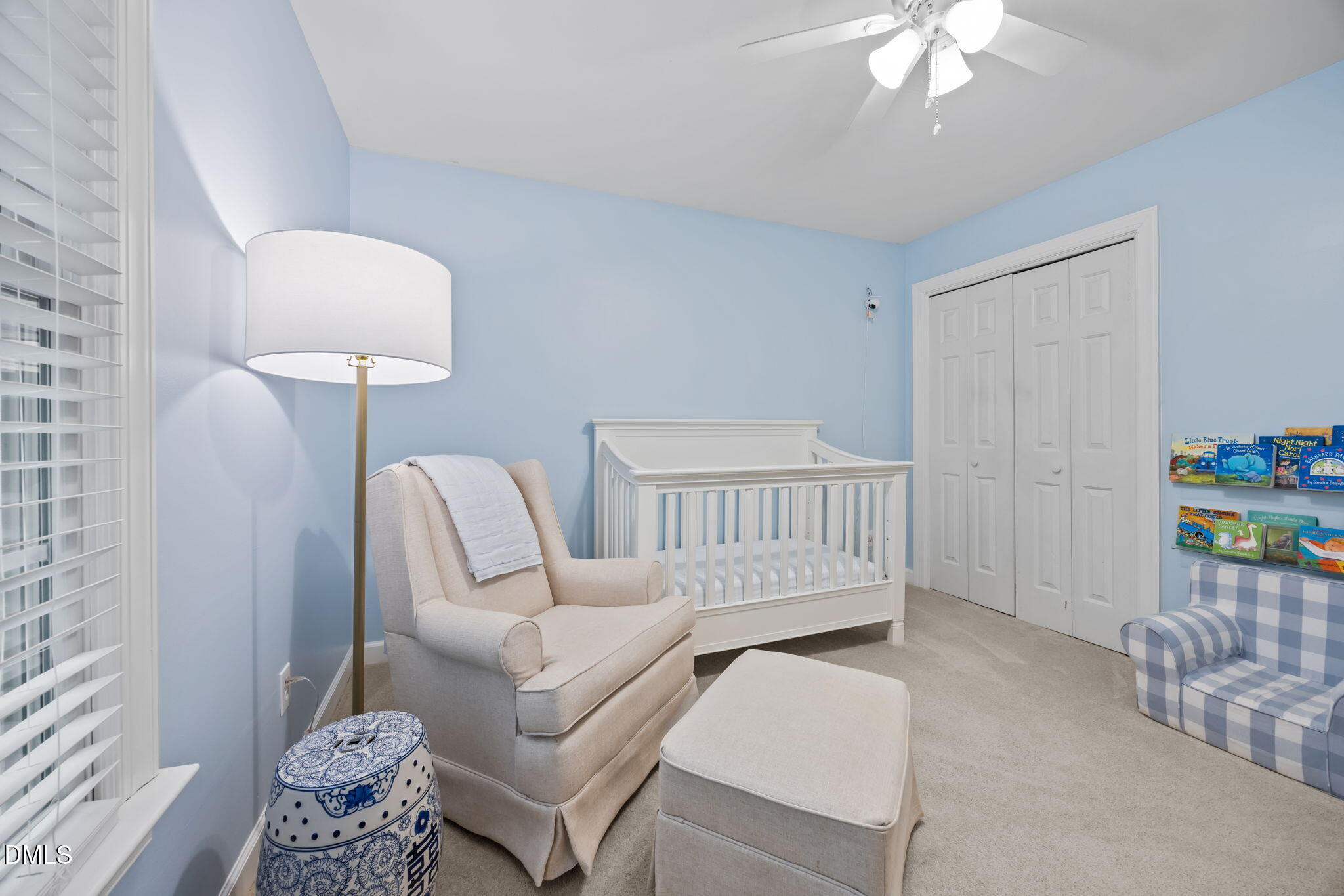562 Weathergreen Drive Raleigh, NC 27615 - Photo 26 of 47 a bedroom with furniture and a chandelier