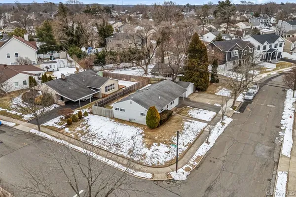 an aerial view of a city with lots of residential buildings