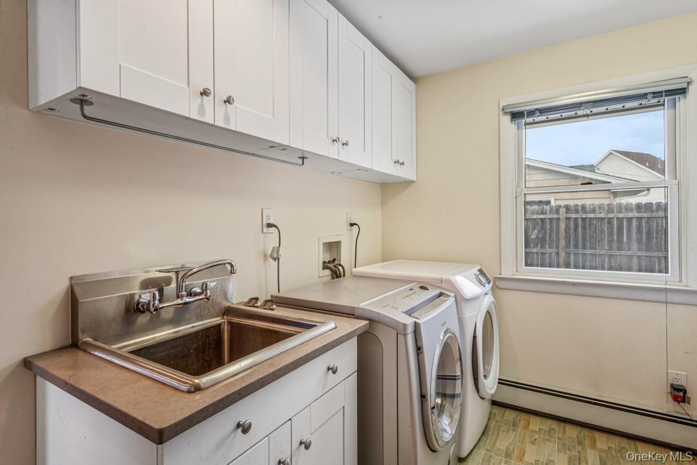 1 Virginia Road Syosset, NY 11791 - Photo 13 of 16 a utility room with dryer and washer