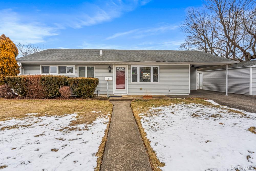 1 Virginia Road Syosset, NY 11791 - Photo 2 of 16 front view of a house with a yard