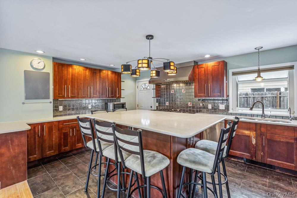 1 Virginia Road Syosset, NY 11791 - Photo 4 of 16 a dining table with chairs and window