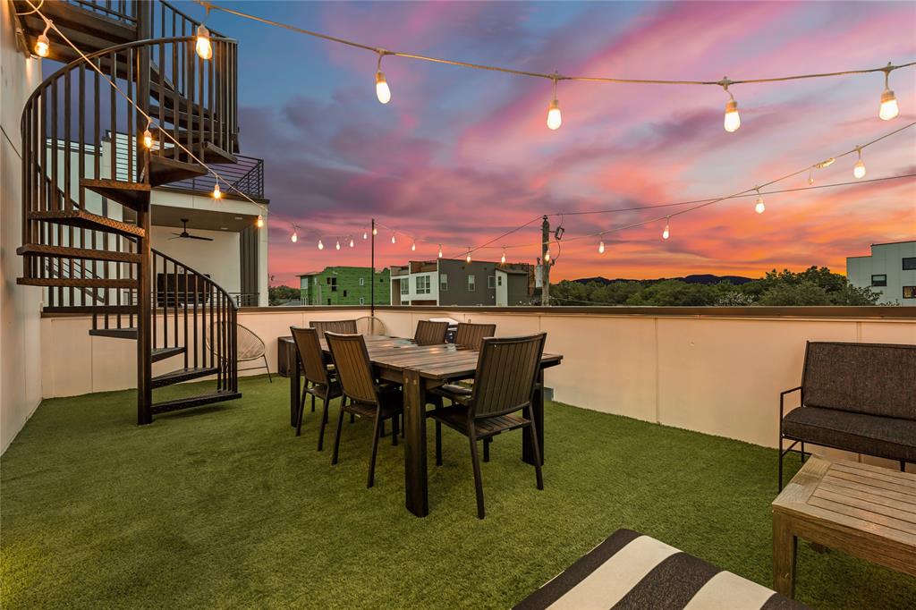 1002 Mobile Street, Unit 1 Dallas, TX 75208 - Photo 1 of 34 a view of a chairs and table in patio