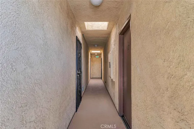 a view of a balcony with wooden floor