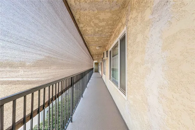 a view of parking garage with cars