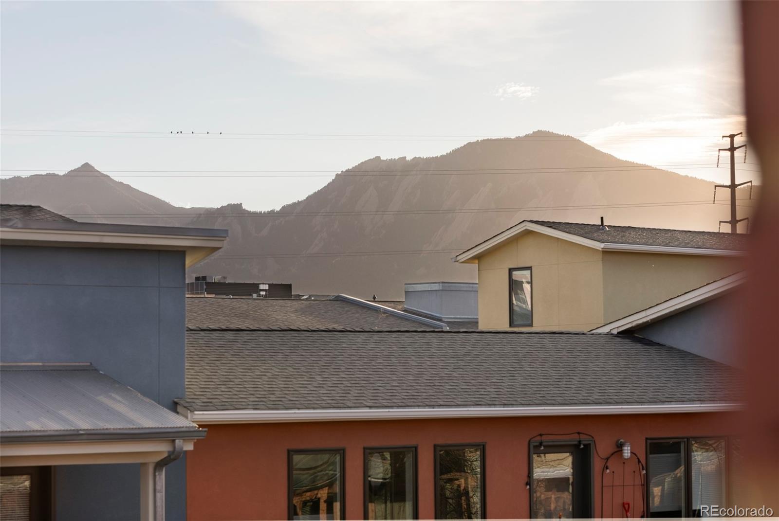 3265 Foundry Place, Unit 101O Boulder, CO 80301 - Photo 17 of 36 a view of a house with a window and balcony