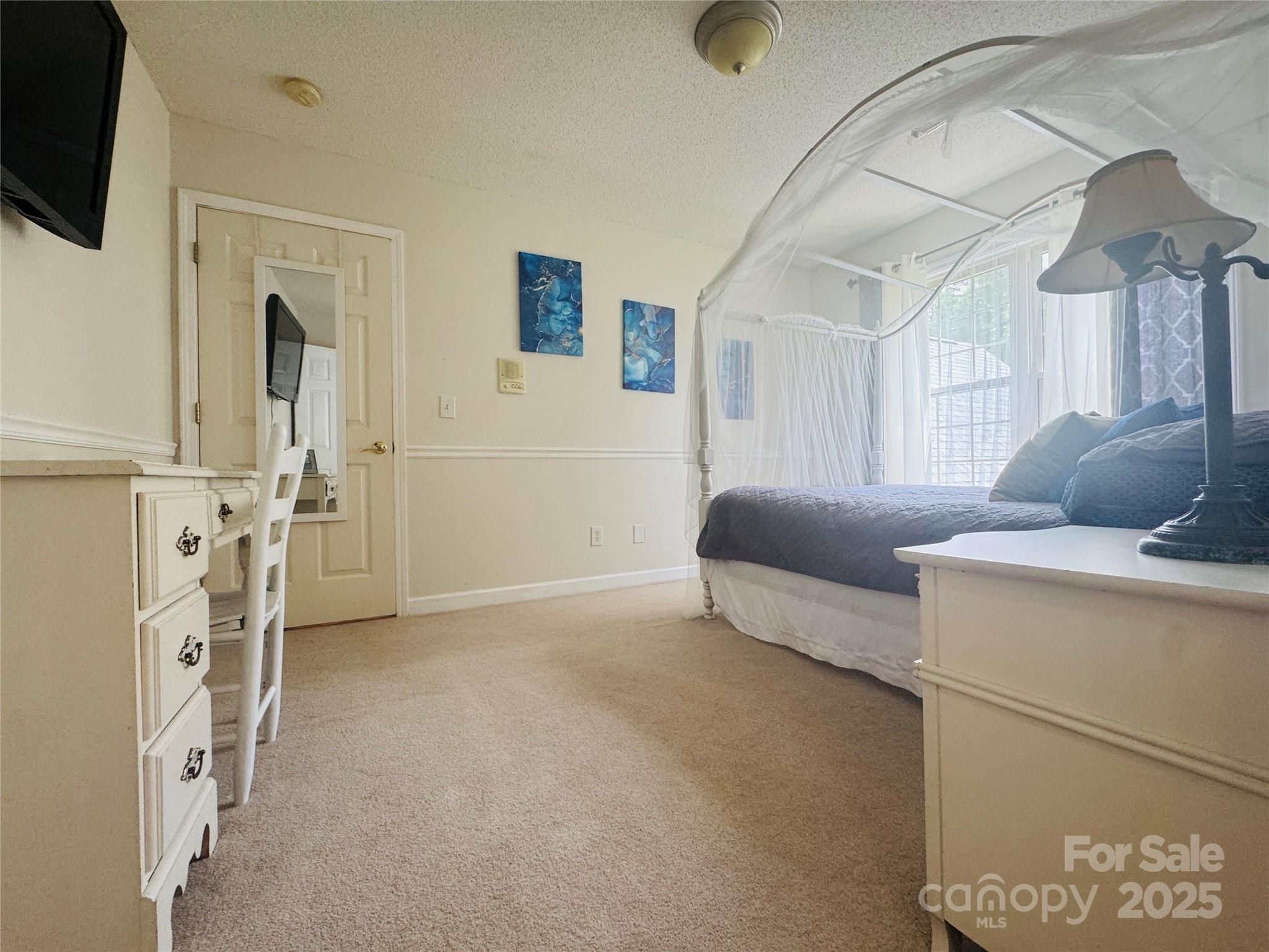 160 Dockside Drive Salisbury, NC 28146 - Photo 34 of 43 a living room with furniture and a flat screen tv