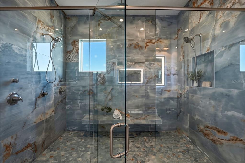 534 Crystal Drive Madeira Beach, FL 33708 - Photo 33 of 68 a bathroom with a shower