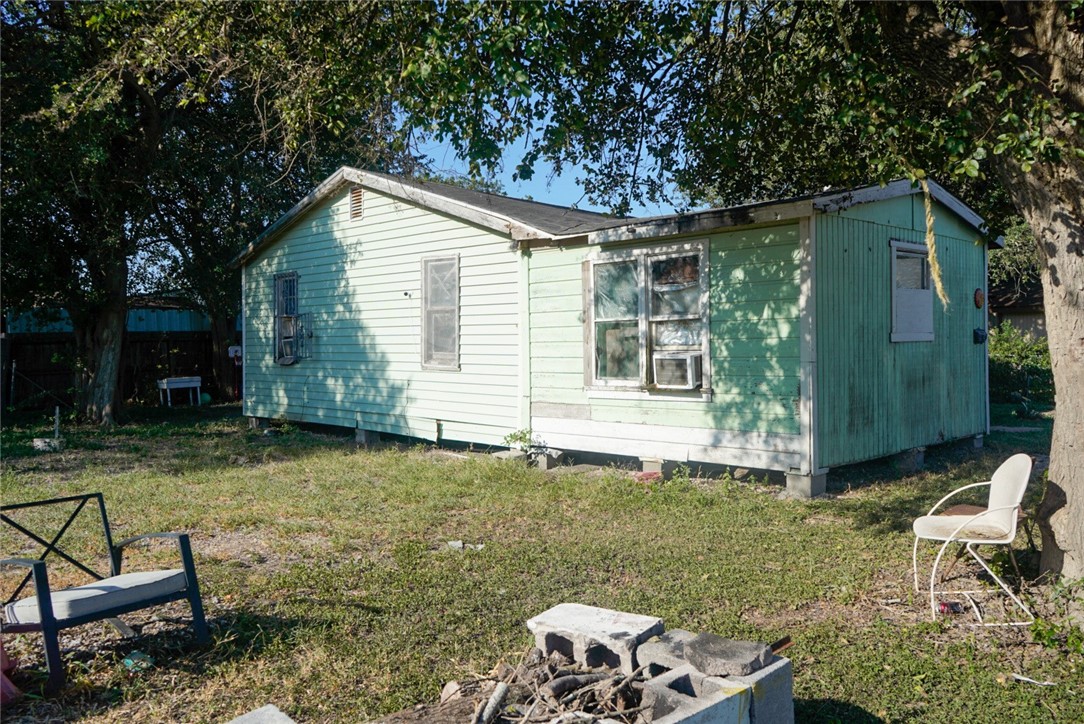 2613 Mary Street Corpus Christi, TX 78405 - Photo 3 of 6 a view of backyard of house with seating space