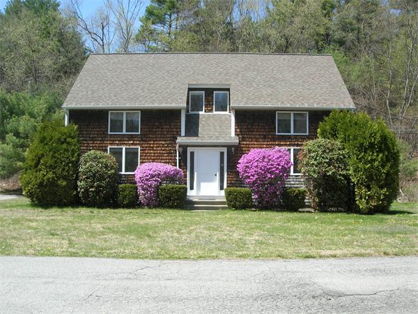 499-a&b Boston Road Groton, MA 01450 - Photo 1 of 8 a front view of a house with yard