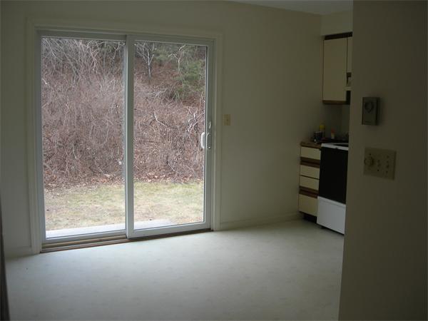499-a&b Boston Road Groton, MA 01450 - Photo 3 of 8 a view of empty room with a fireplace