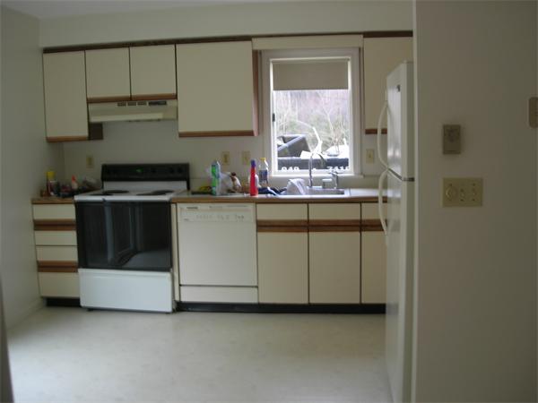 499-a&b Boston Road Groton, MA 01450 - Photo 5 of 8 a kitchen with a stove and a refrigerator