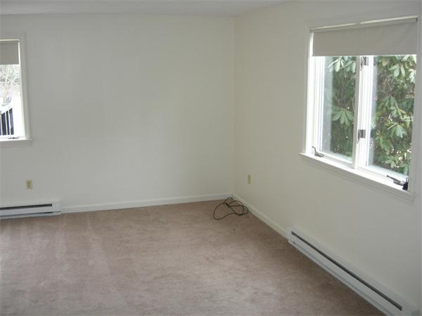 499-a&b Boston Road Groton, MA 01450 - Photo 8 of 8 an empty room with a window