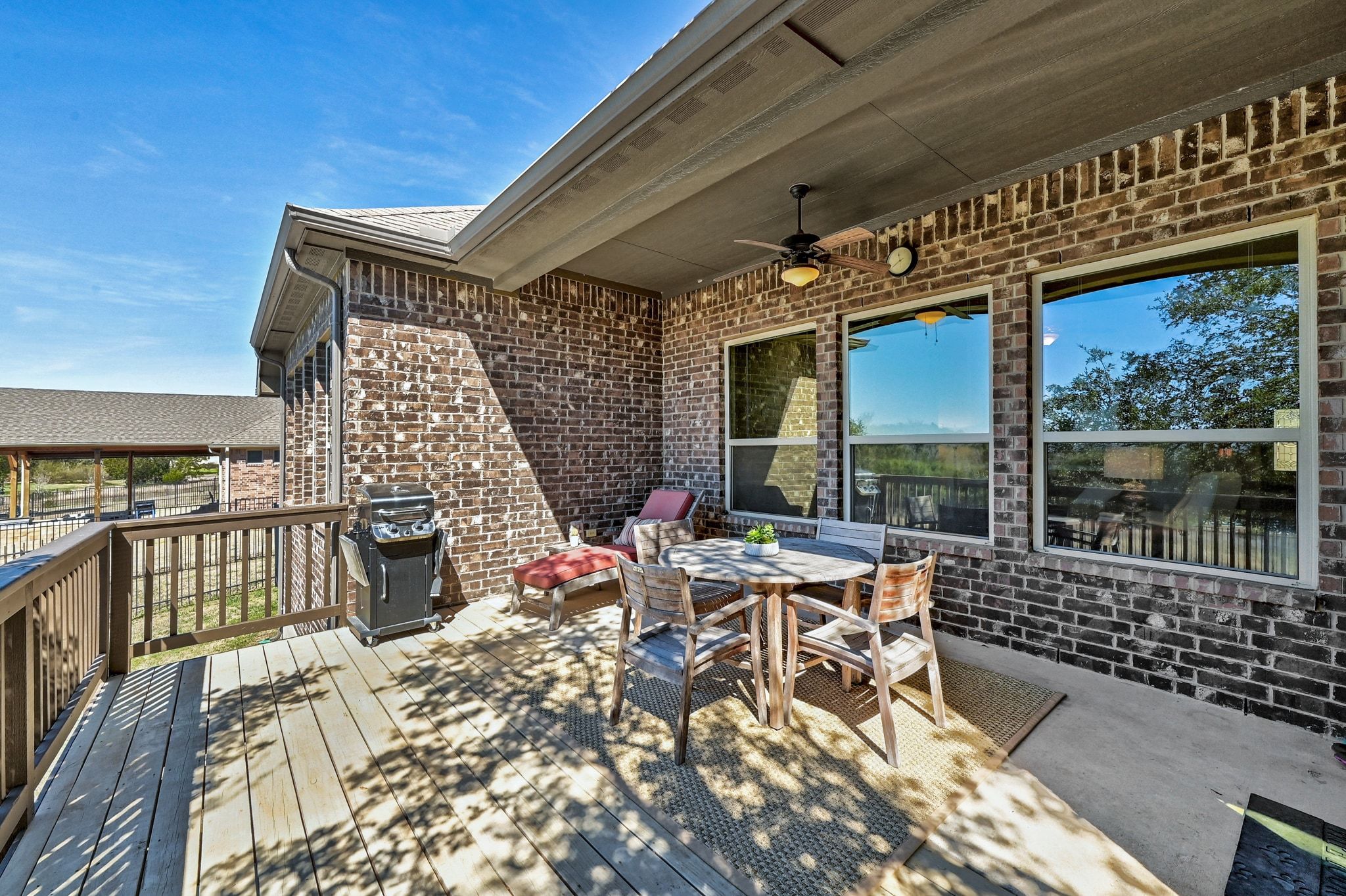 960 Blue Ridge Drive Dripping Springs, TX 78620 - Photo 25 of 38 Enjoy your evening meal on the covered back porch overlooking the pool.