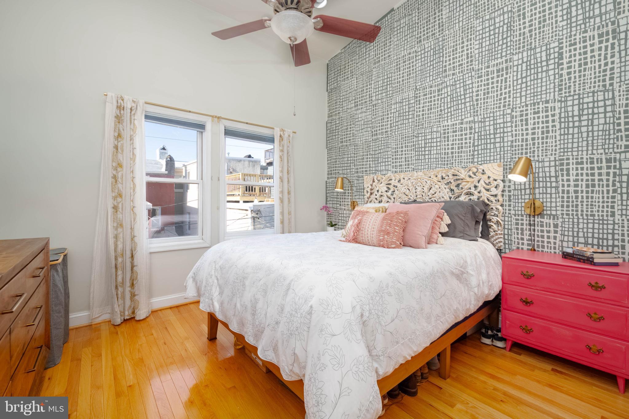 318 South Duncan Street Baltimore, MD 21231 - Photo 13 of 27 a bedroom with a bed and window