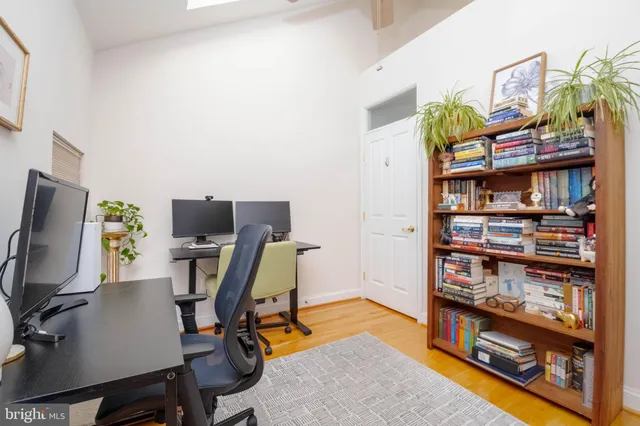 a view of a workspace with furniture