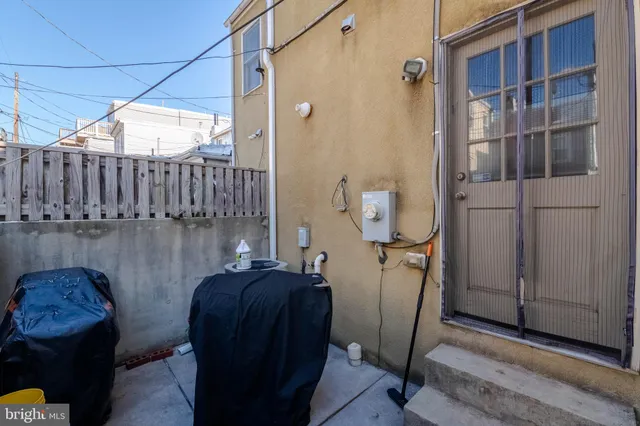 a view of balcony with furniture