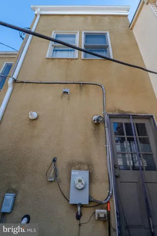a bathroom with a shower and a sink