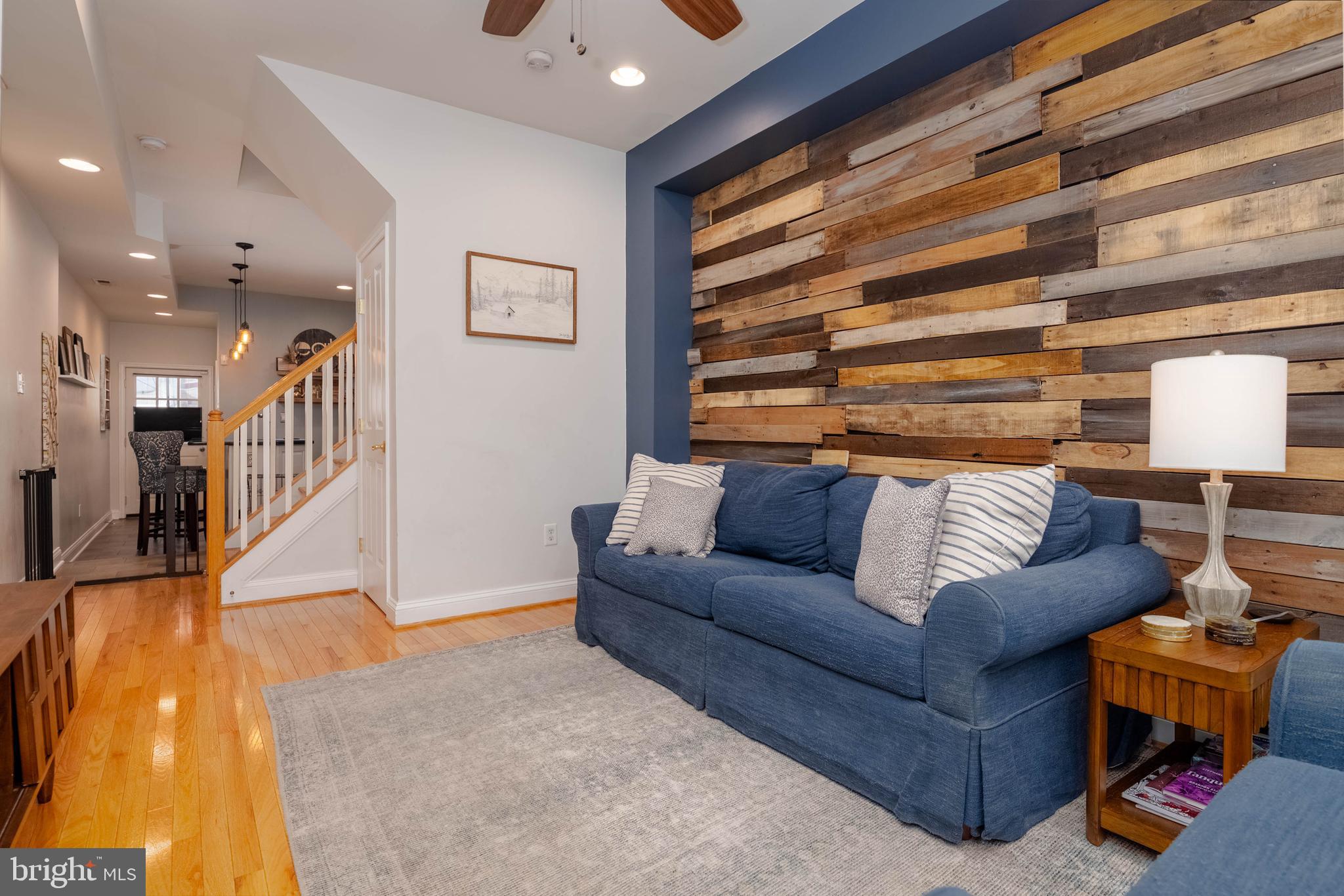 318 South Duncan Street Baltimore, MD 21231 - Photo 5 of 27 a living room with furniture and a large window