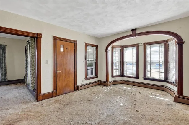 an empty room with windows