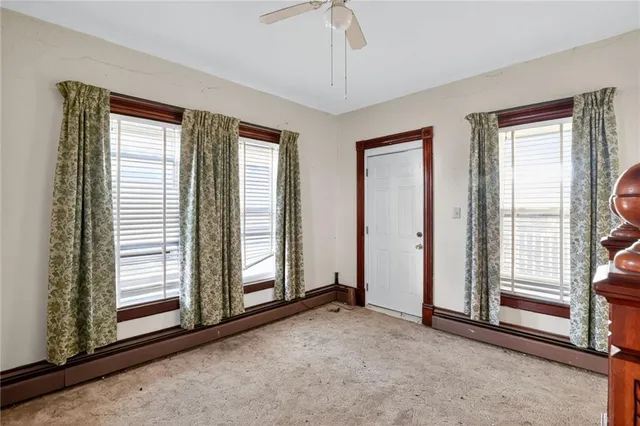 an empty room with windows