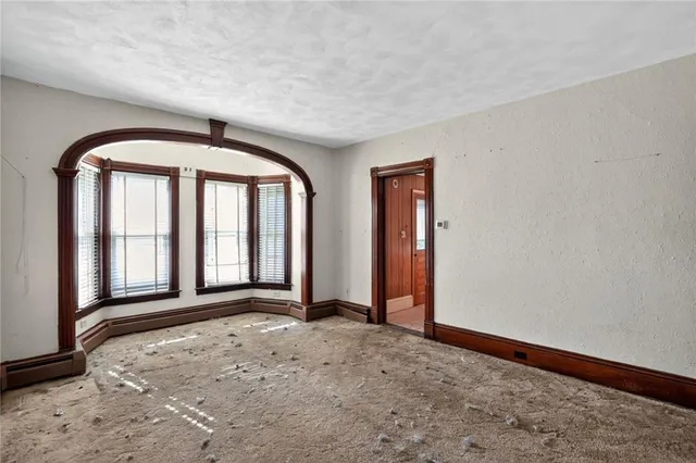 an empty room with windows