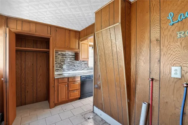 a kitchen with stainless steel appliances granite countertop a stove sink and cabinets