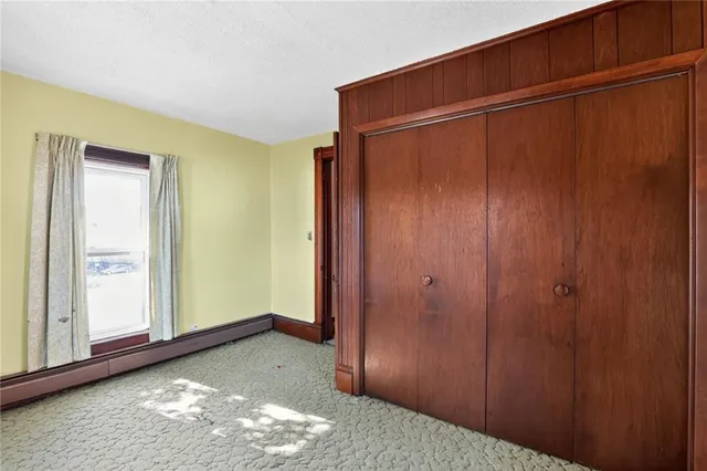 a bathroom with a toilet and a sink