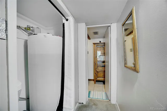 a spacious bathroom with double sink and a mirror