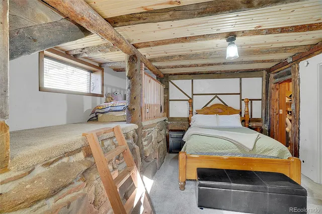 a bedroom with a bed and a walk in closet