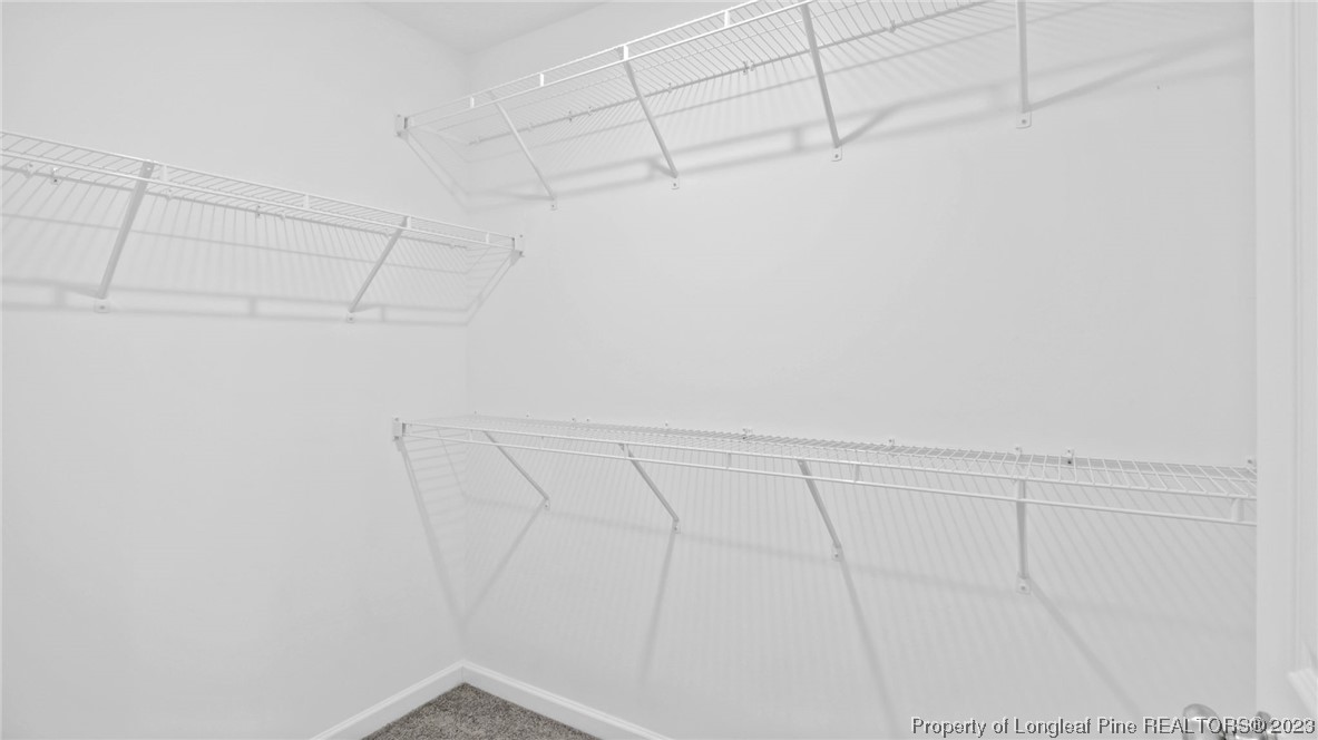 217 Fieldbrook Street Raeford, NC 28376 - Photo 23 of 42 a view of a room with racks on the wall