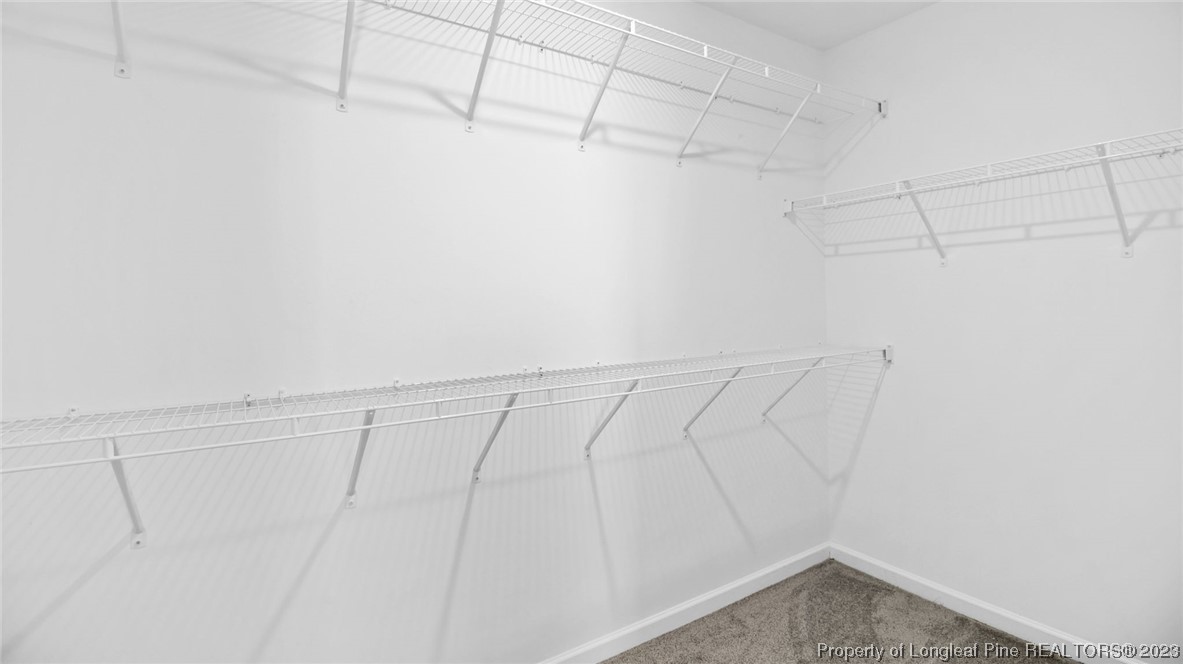 217 Fieldbrook Street Raeford, NC 28376 - Photo 25 of 42 a view of a room with racks on the wall