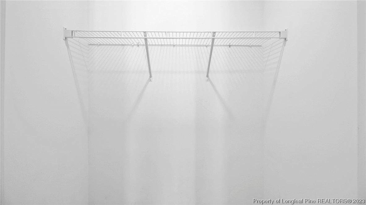 217 Fieldbrook Street Raeford, NC 28376 - Photo 33 of 42 a view of a room with racks on the wall