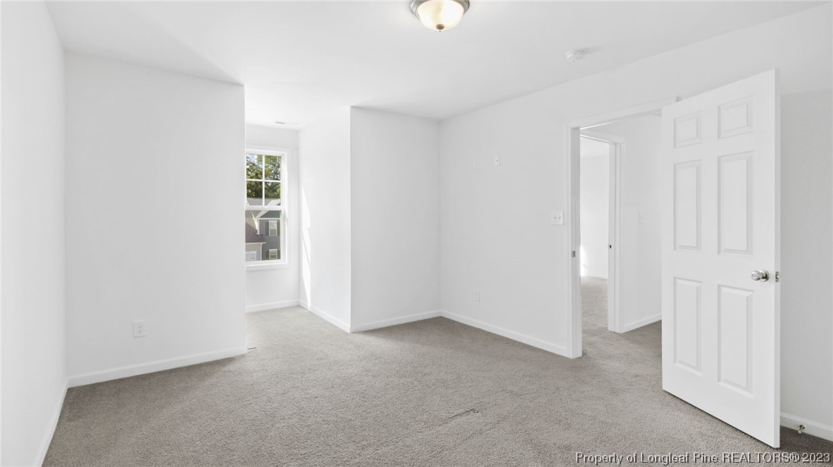 217 Fieldbrook Street Raeford, NC 28376 - Photo 35 of 42 an empty room with windows