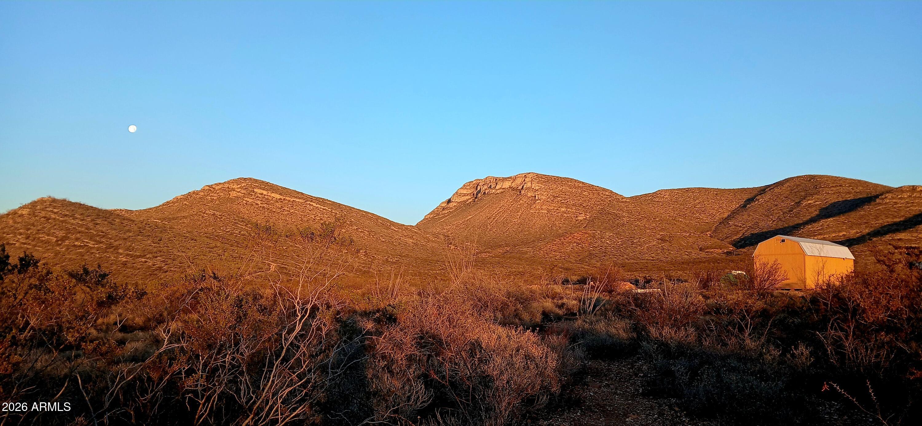 Tbd West Tbd W Luna Nueva Road Bisbee, AZ 85603 - Photo 3 of 6 a view of a house with a mountain and a forest