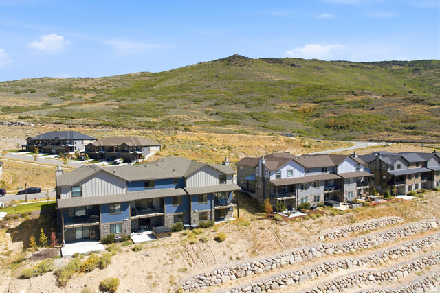 6039 North Westridge Road Heber City, UT 84032 - Photo 67 of 71 Contemporary multi-story residences featuring balconies, patios, and a stone retaining wall system