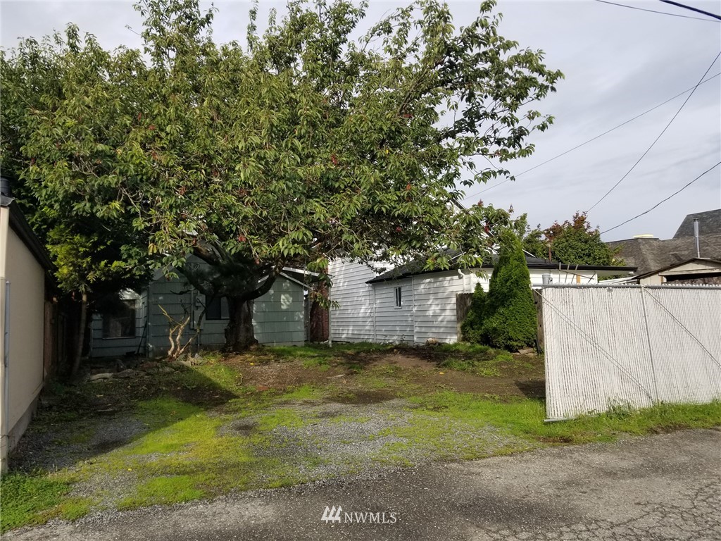 2321 Rucker Avenue Everett, WA 98201 - Photo 11 of 12 a view of a house with a yard